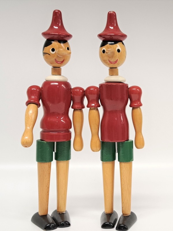 2 houten Pinokkio figuren